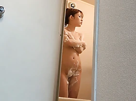 Bonny japanese girl takes a shower