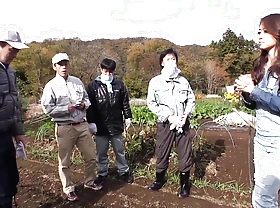 Cute Japanese girl delights four Japanese men encircling the square