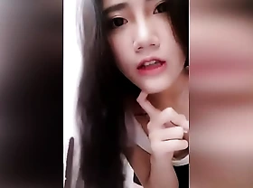 Unskilful young chinese girl masturbates with a sex toy